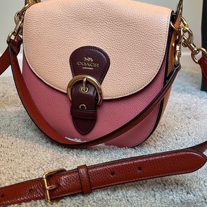 Pink and orange Coach purse